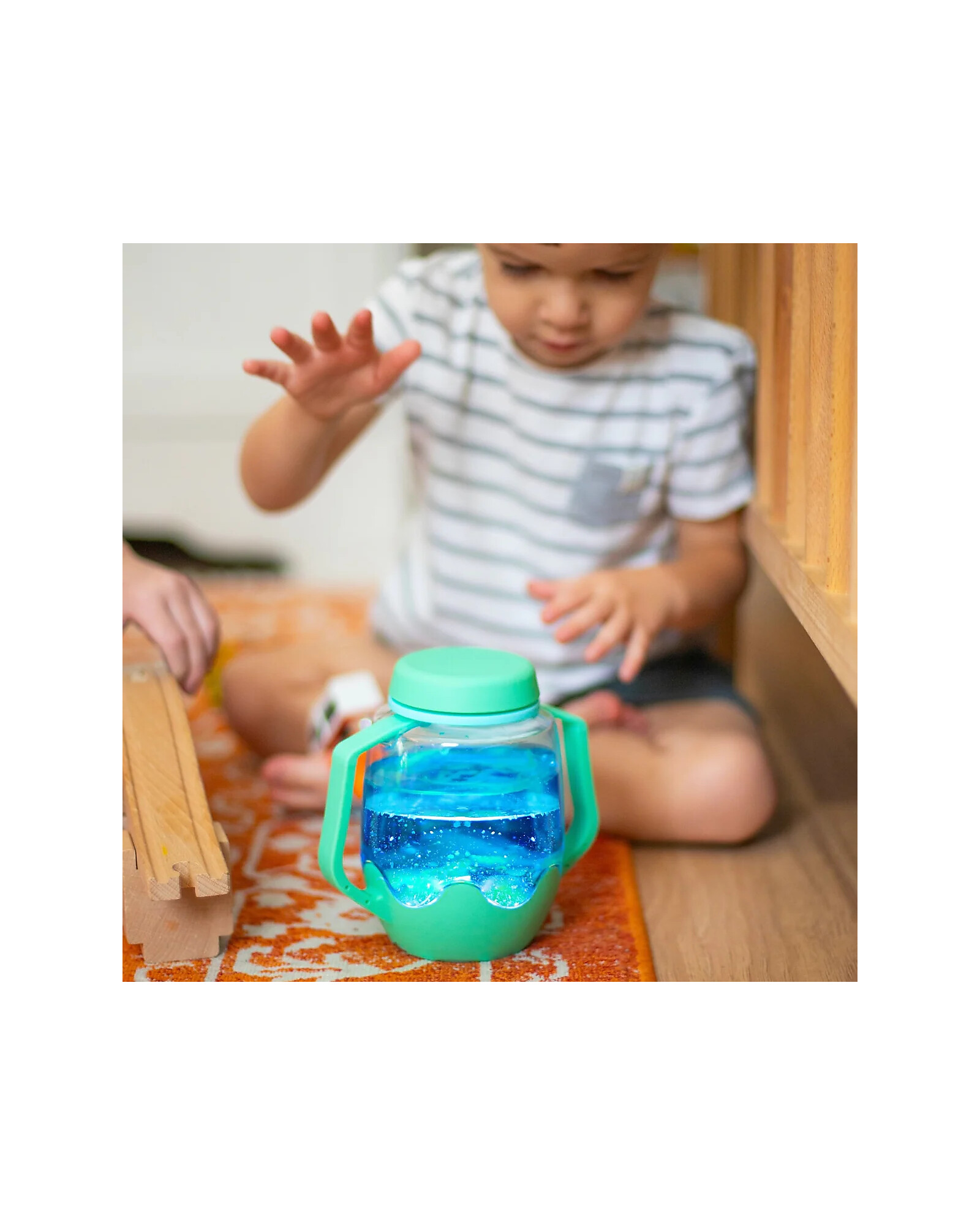 Glo Pals Barattolo Gioco Sensoriale teal con luce ad acqua