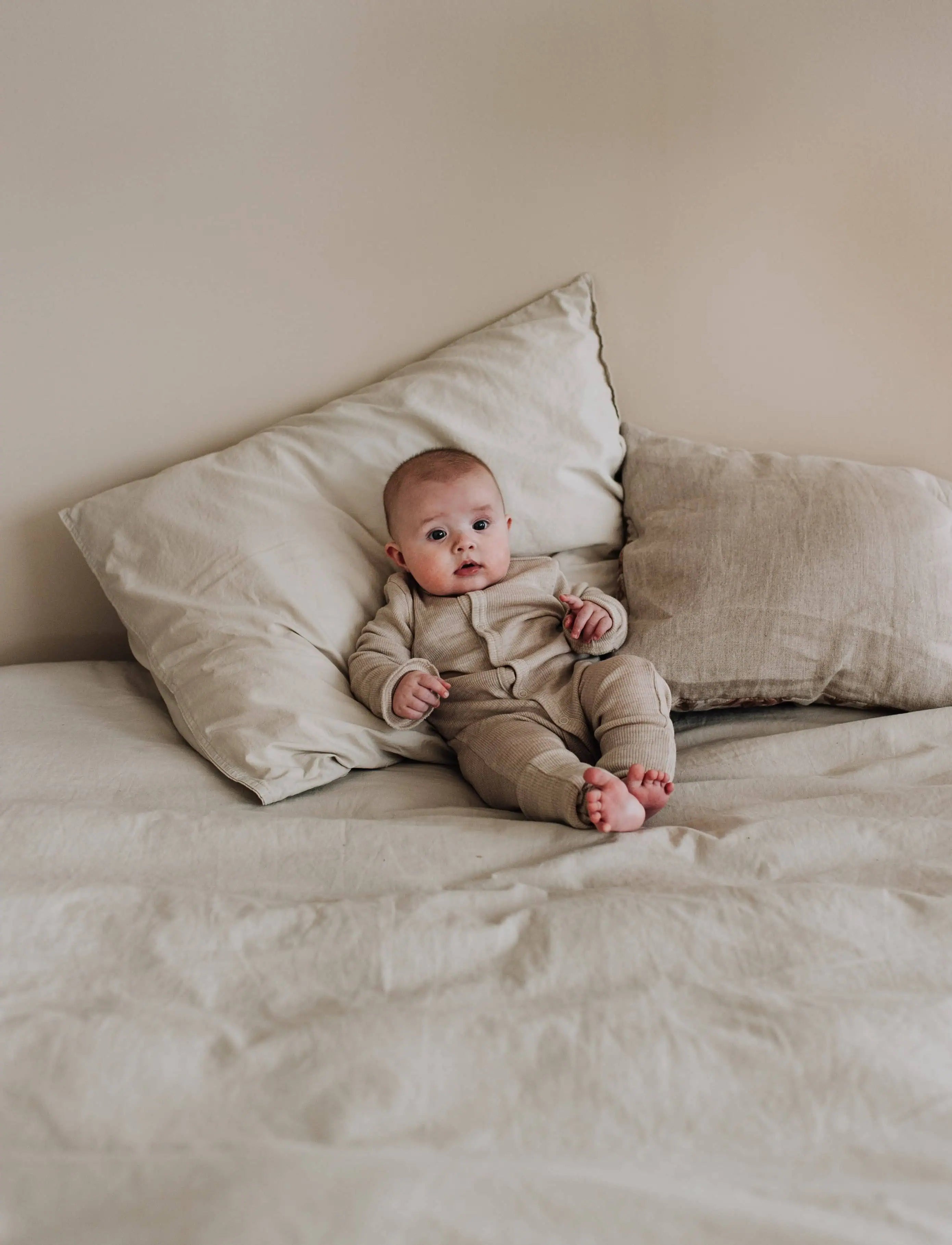 Kico Label pigiama intero con piedini lana merino