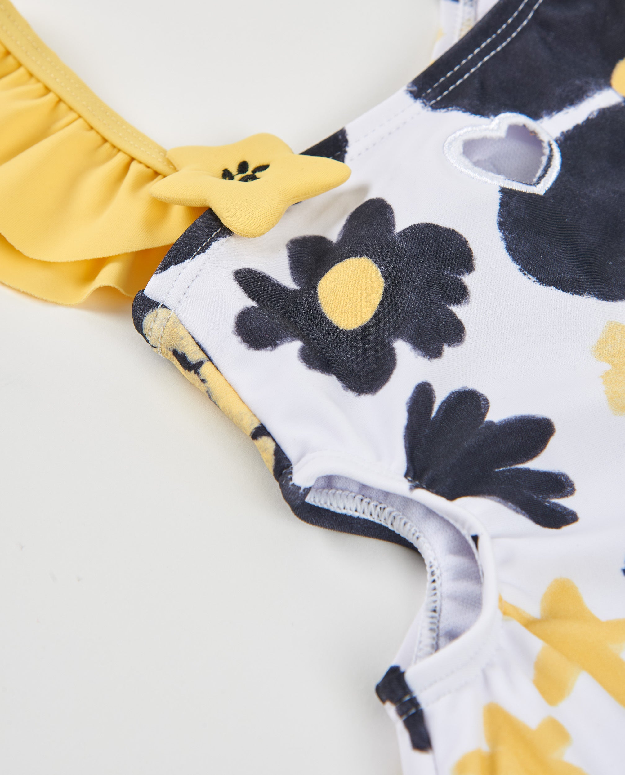 Tuc Tuc costume intero bimba bianco fiori nero