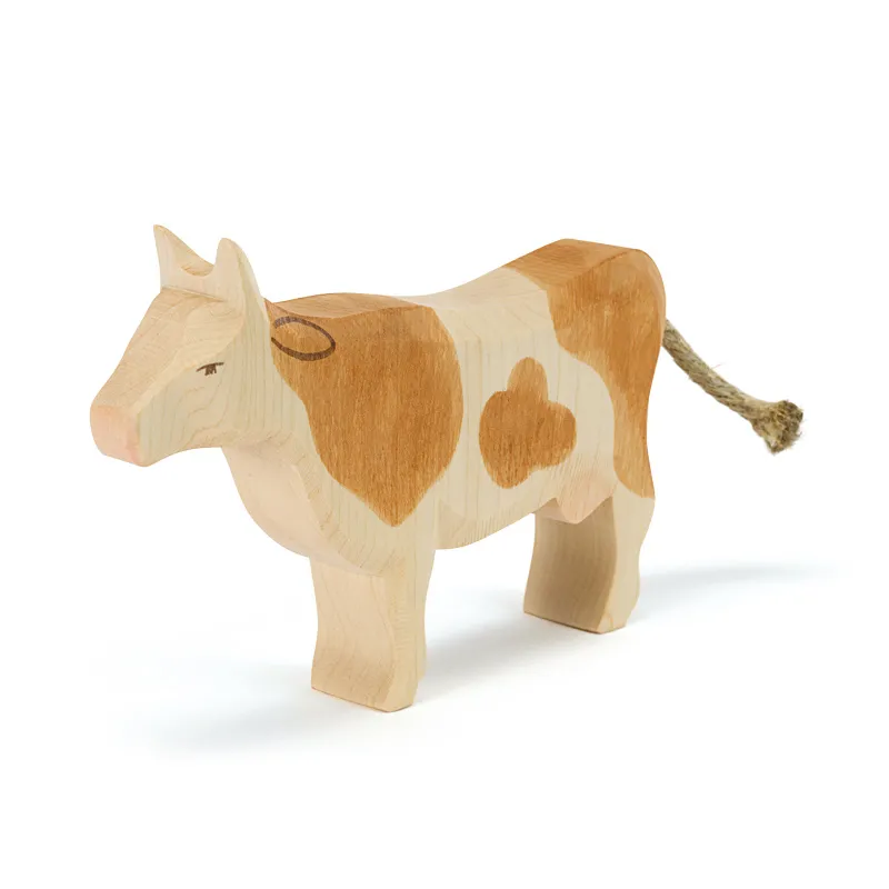 Ostheimer Mucca pezzata marrone figura legno 11,5 cm