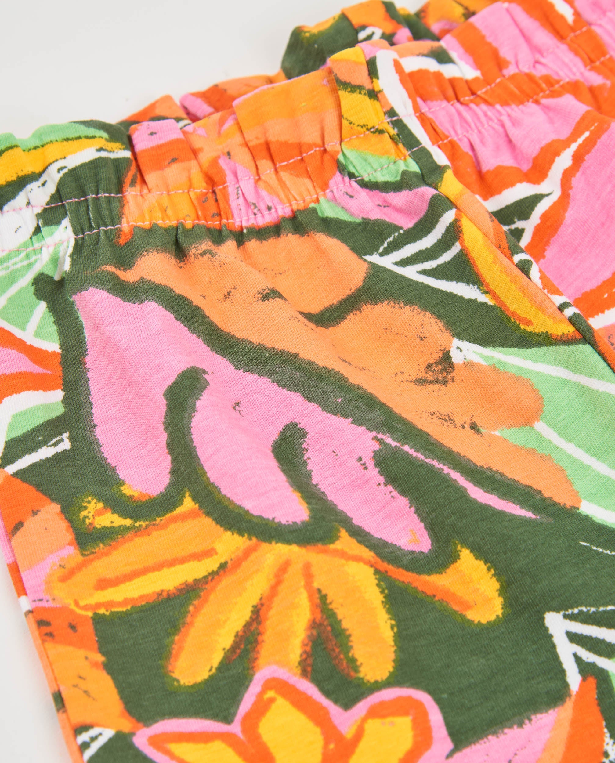 Tuc Tuc shorts bambina arancioni fantasia fiori