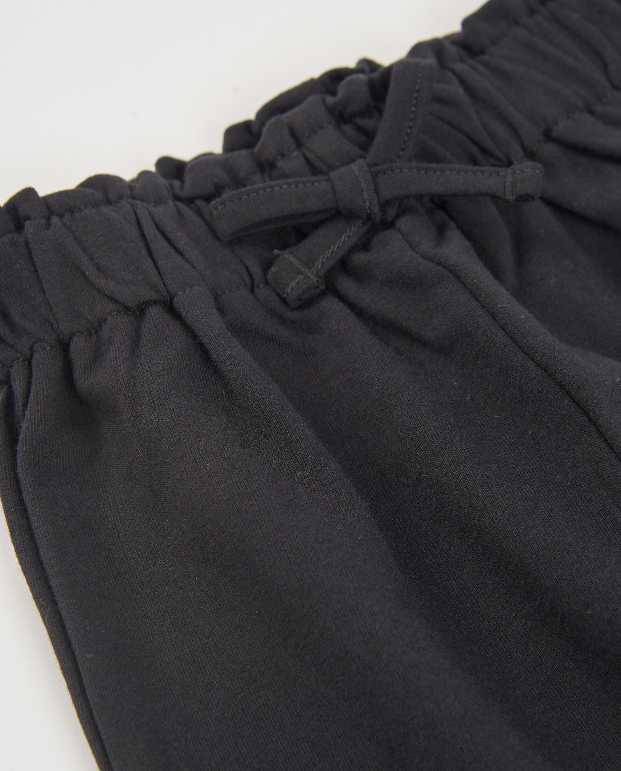 Tuc Tuc pantaloni bambina jersey neri con fiocco