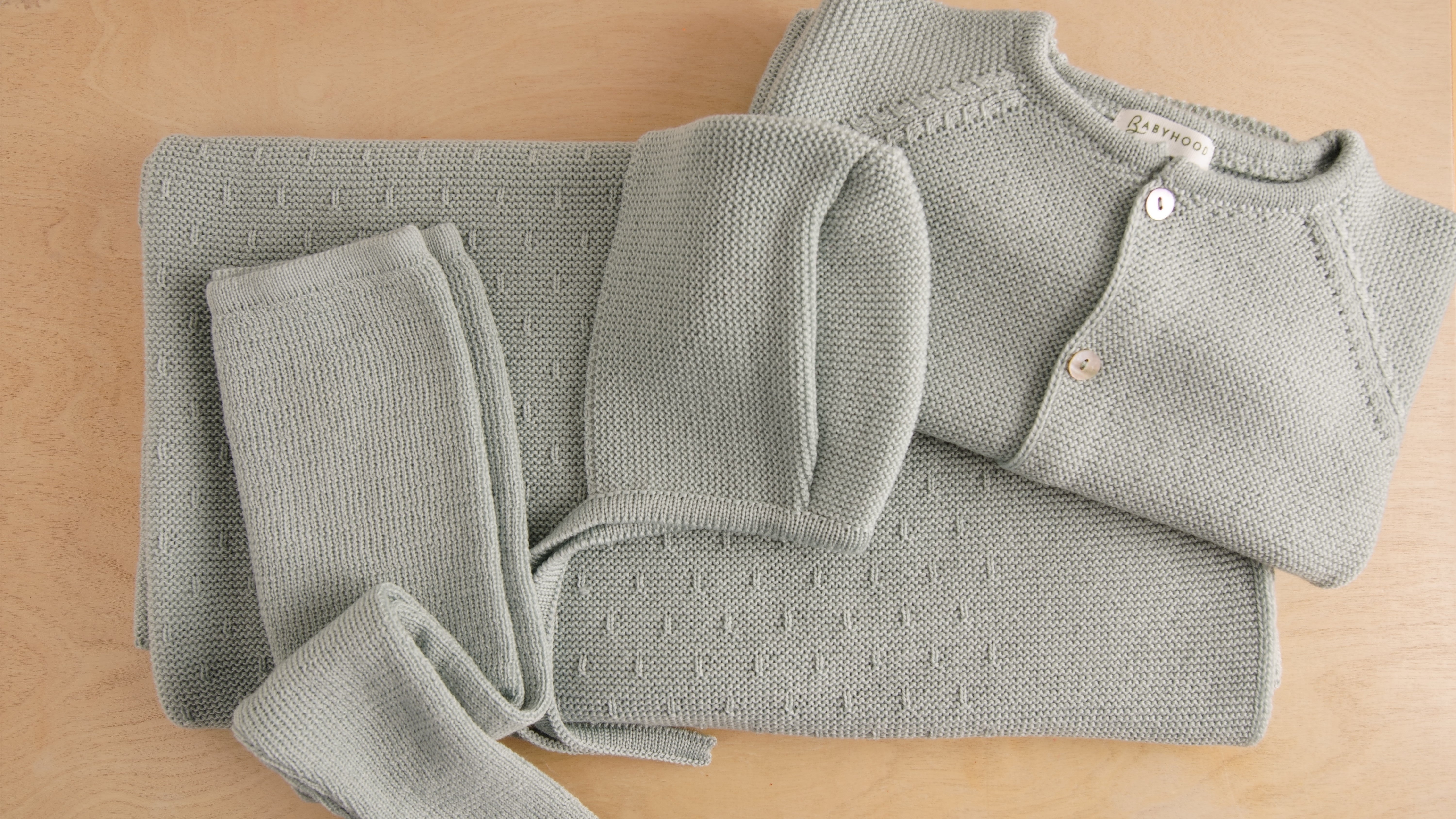 Babyhood cuffia lana merino verde neonato