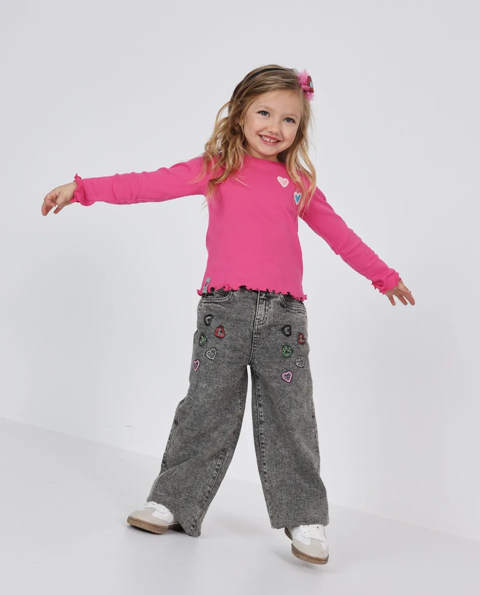Tuc tuc jeans bambina rosa ricamo cuori effetto delavé