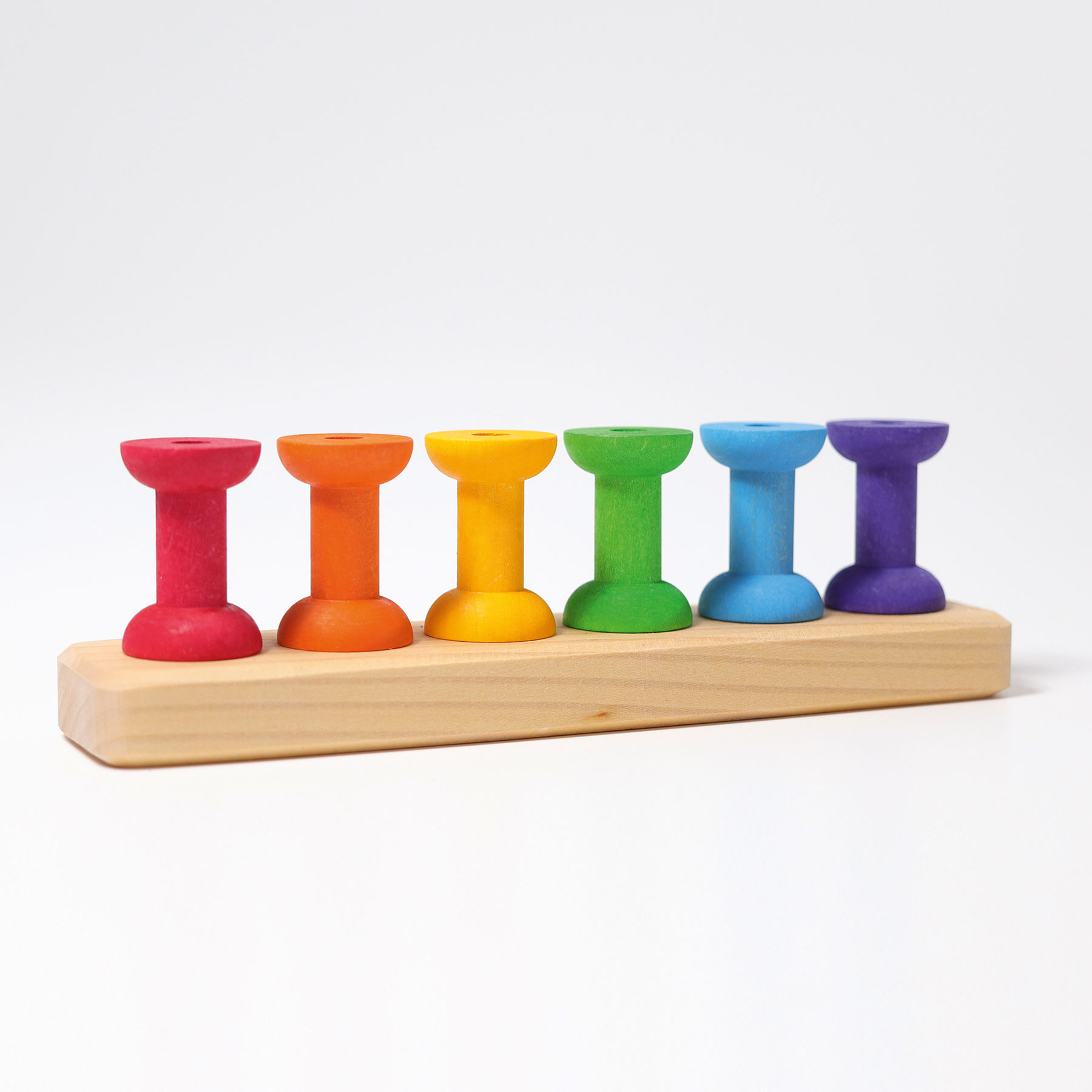 Grimm's Arcobaleno Spolette con ago gioco impilabile legno 12 mesi
