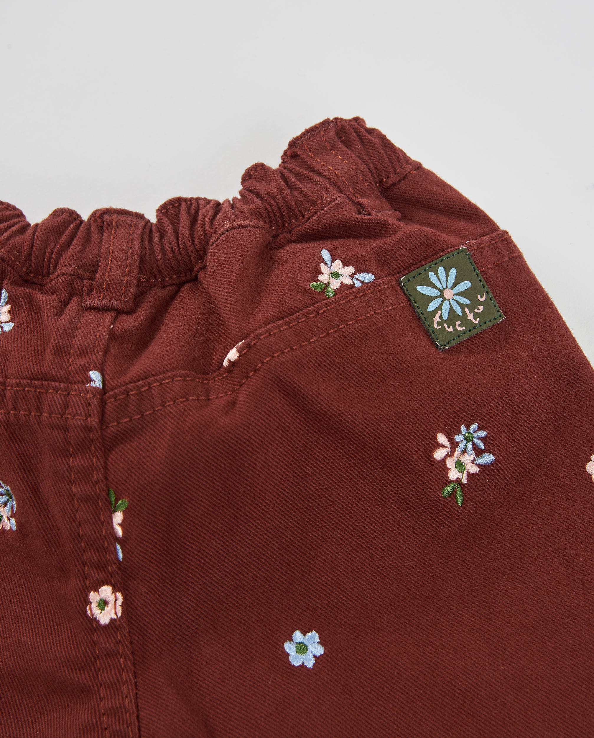 Tuc Tuc pantaloni bambina bordeaux ricamo fiori