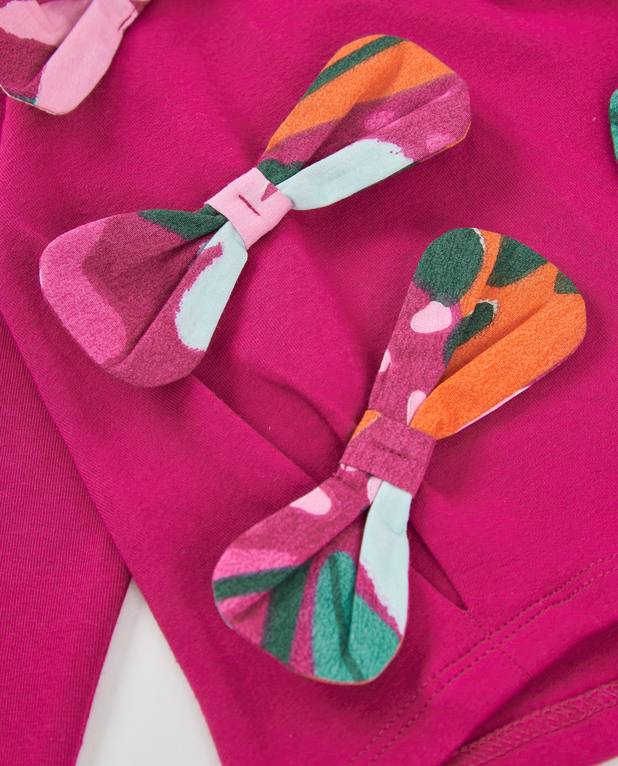Tuc Tuc Geo-Logic Maglia Bambina Viola con Fiocchi