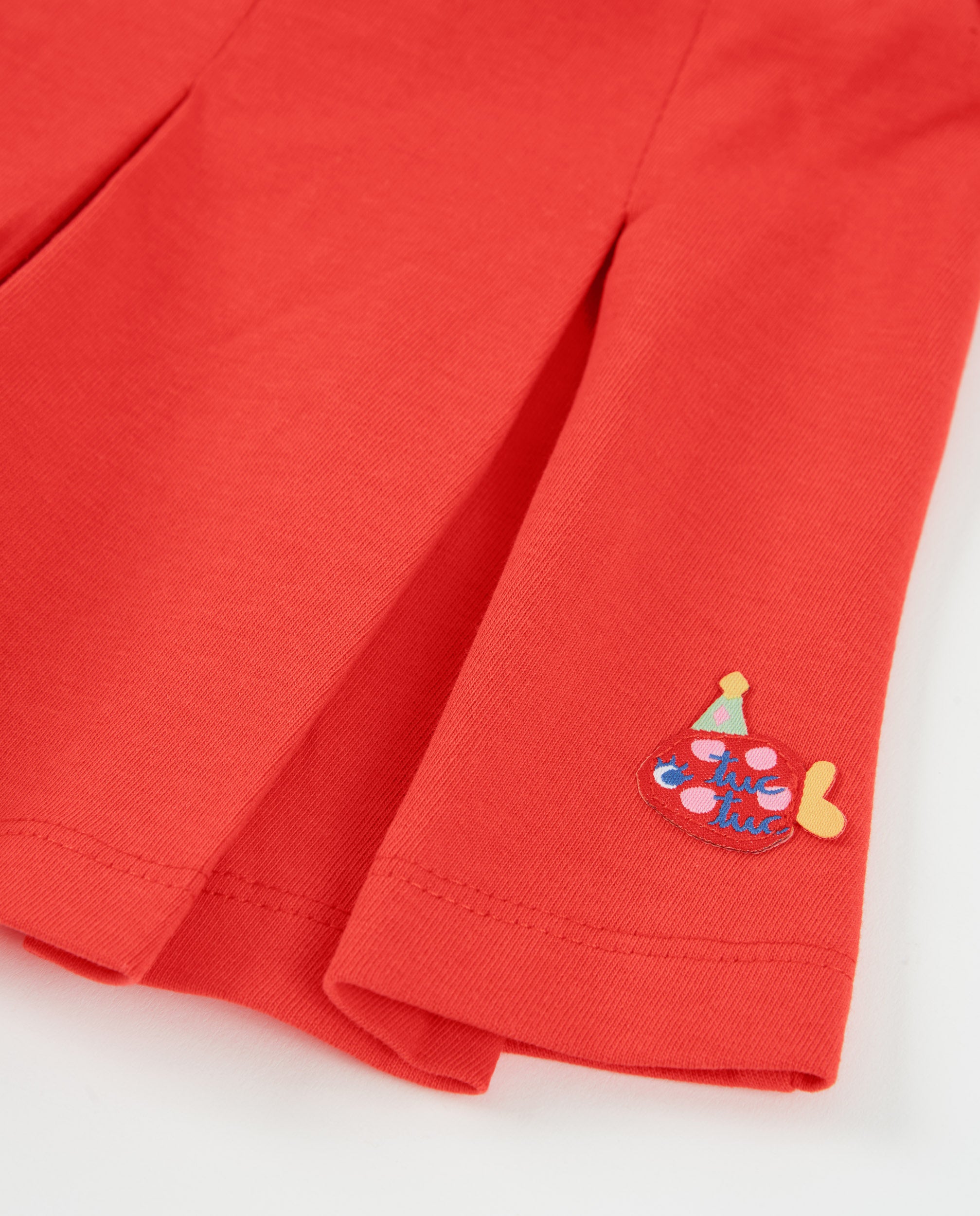 Tuc Tuc gonna rossa 2 anni in maglia con pieghe