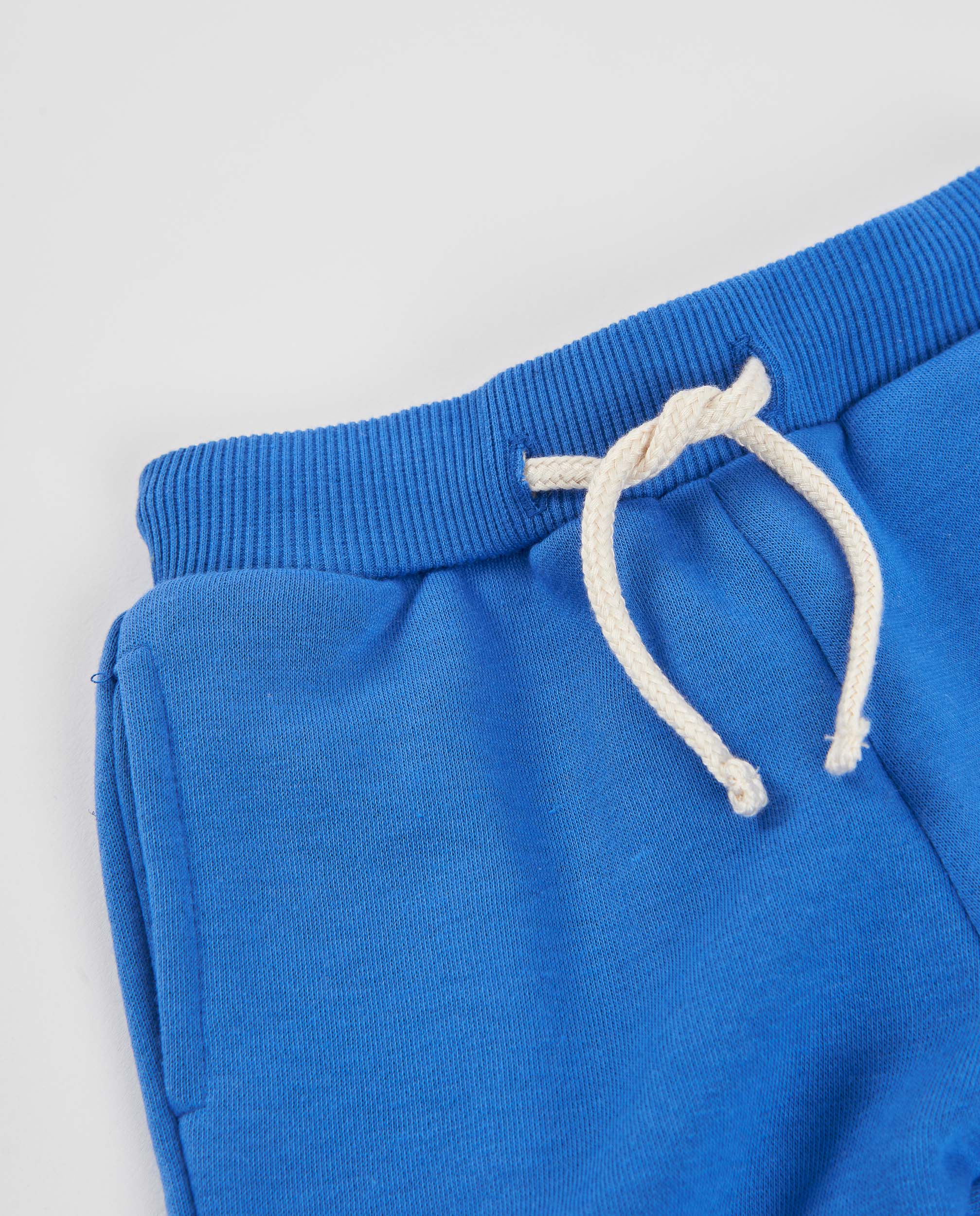 Tuc tuc pantaloni bambino pile blu tasca stampata