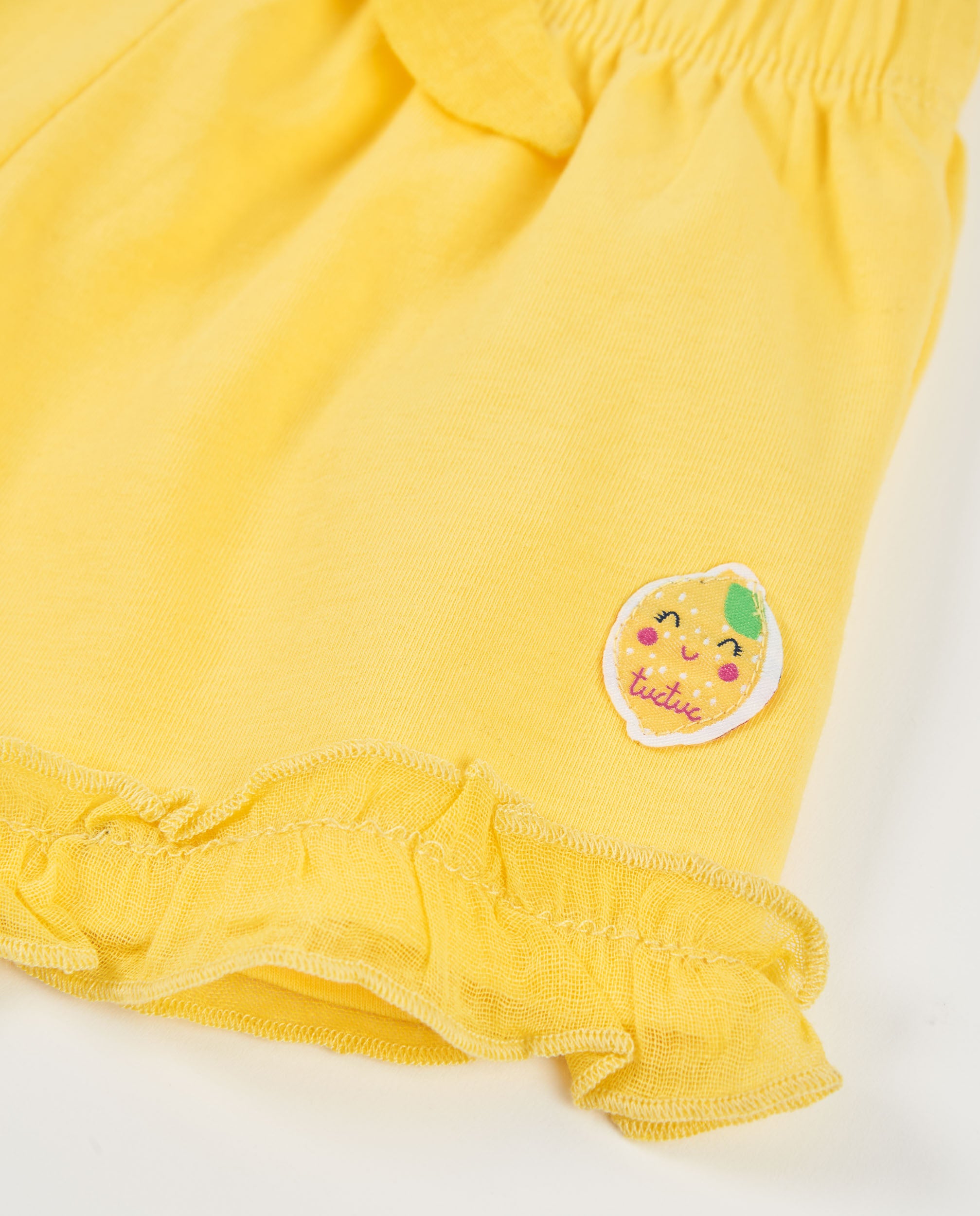 Tuc Tuc shorts bambina gialli con volant e fiocco