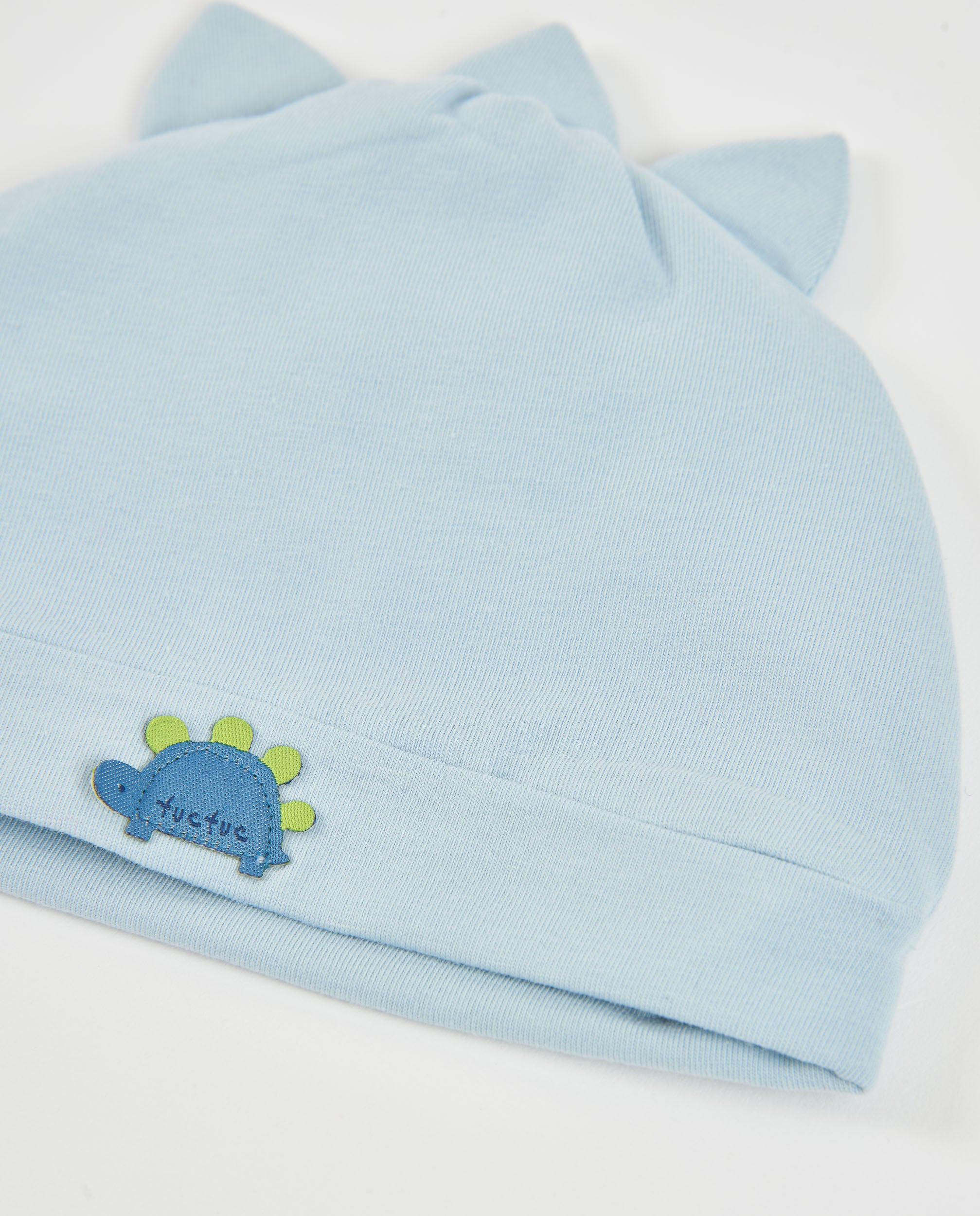 Tuc Tuc cappellino neonato azzurro dinosauro in cotone