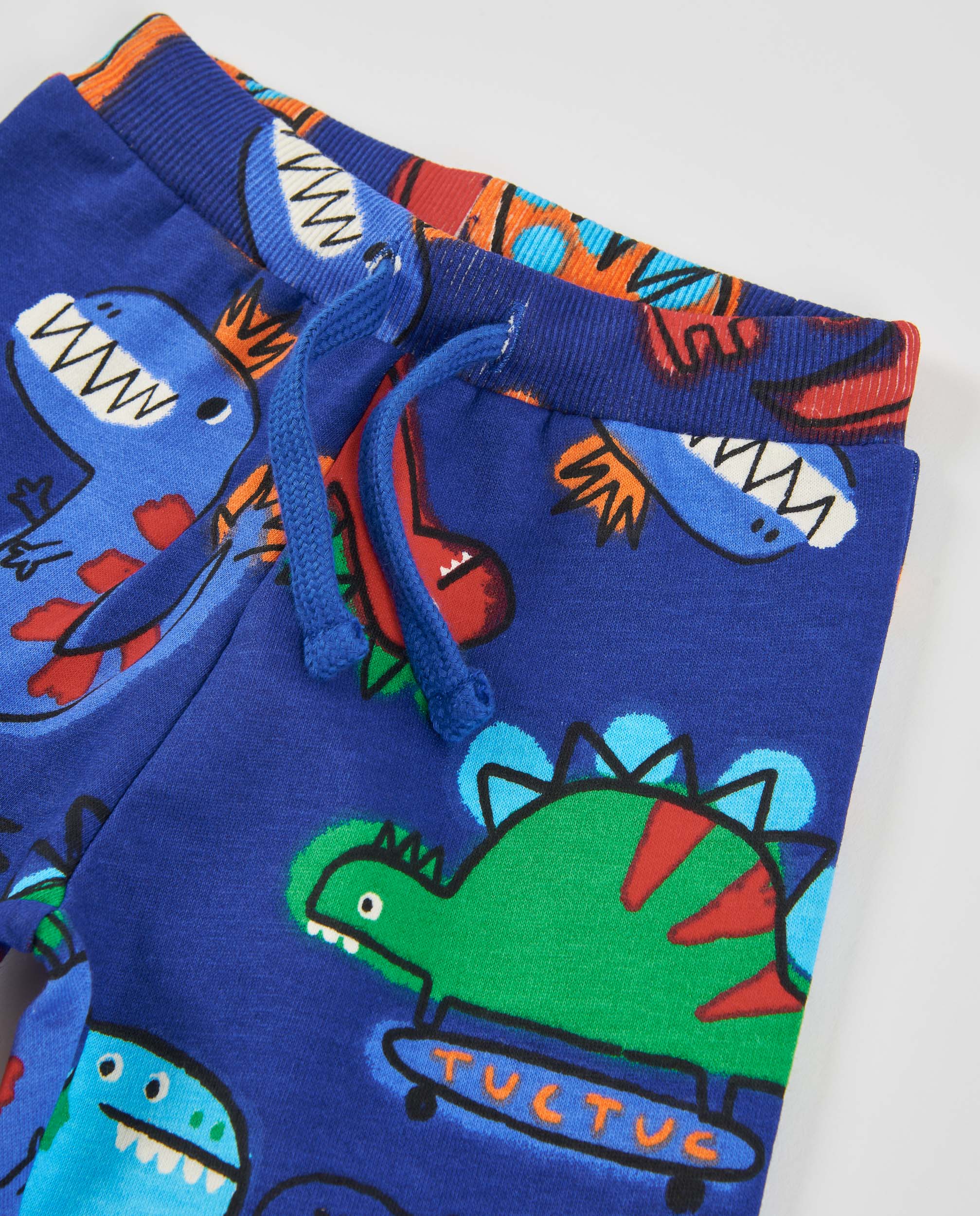 Tuc Tuc Dino Roll pantaloni felpati bimbo blu dinosauro