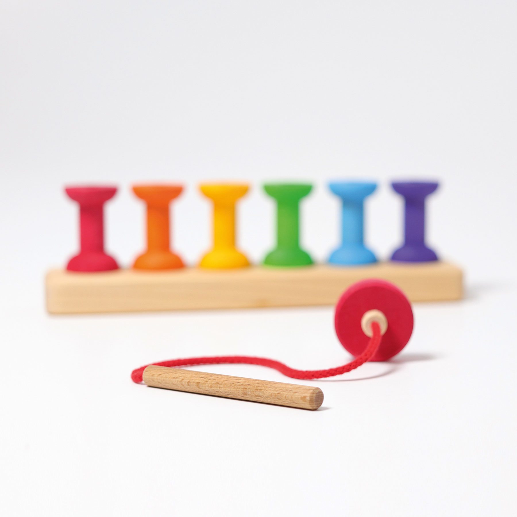 Grimm's Arcobaleno Spolette con ago gioco impilabile legno 12 mesi