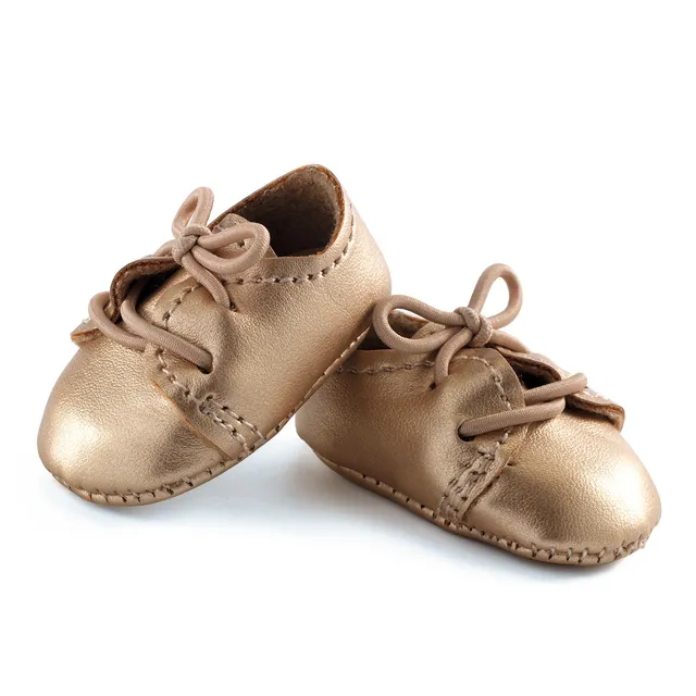 Djeco Pomea scarpe dorate con lacci per bambole