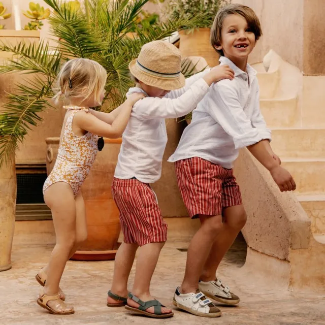 Ella and Rapha Riad Red shorts mare rosso bimbo UPF 50+