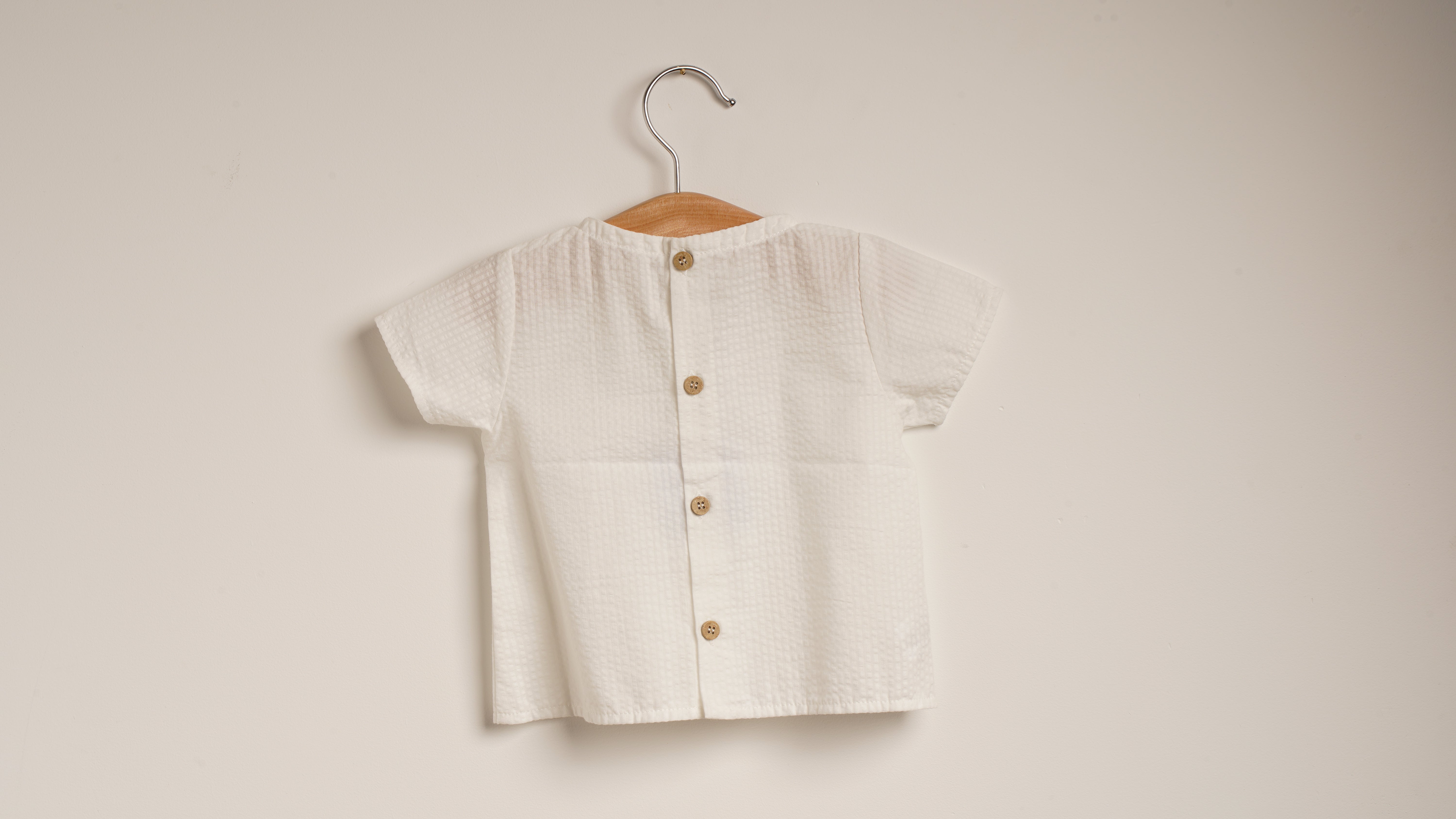 Mebi camicia neonato bianca cotone bottoni legno manica corta