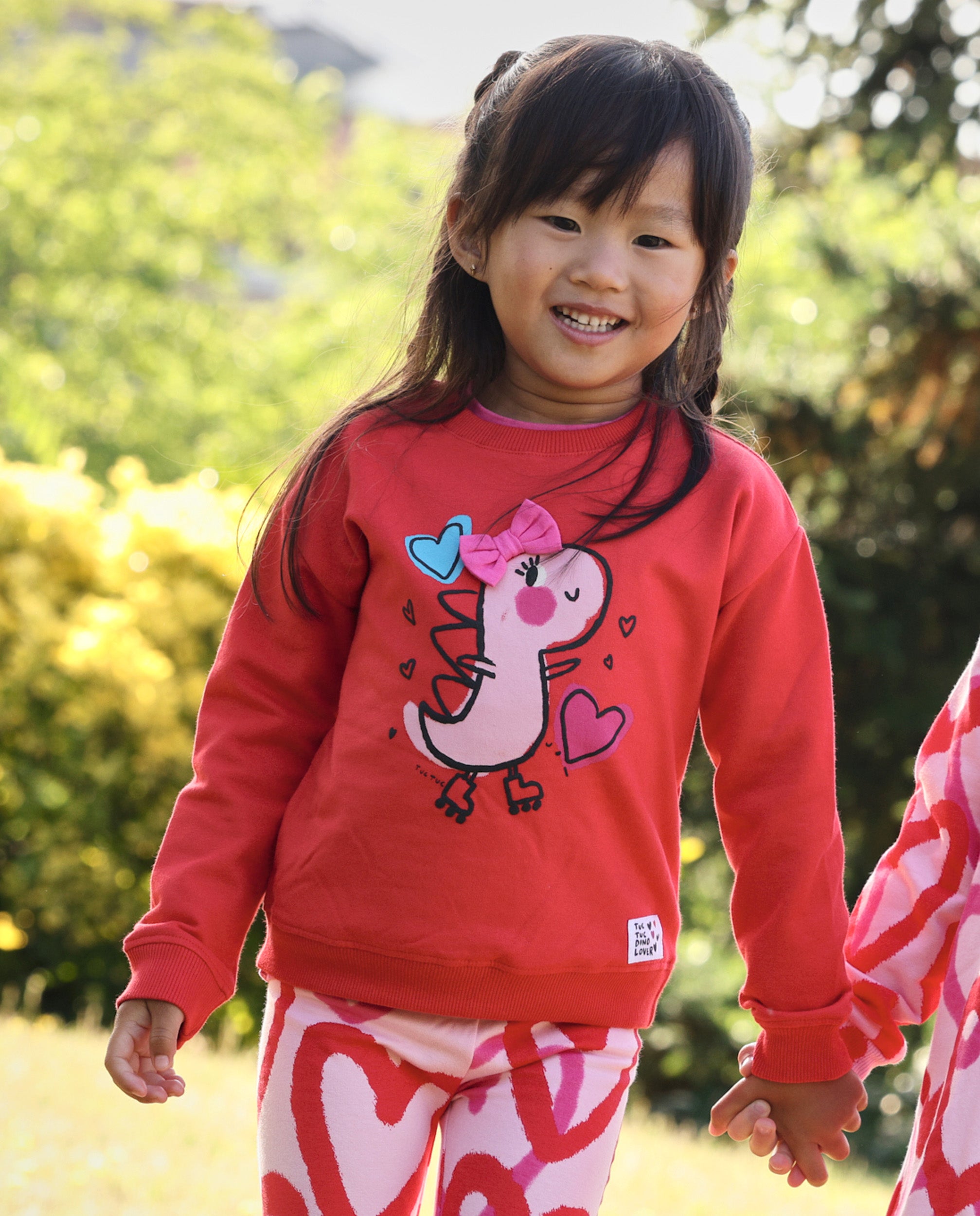 Tuc tuc Dino Roll felpa bambina rossa stampa dinosauro