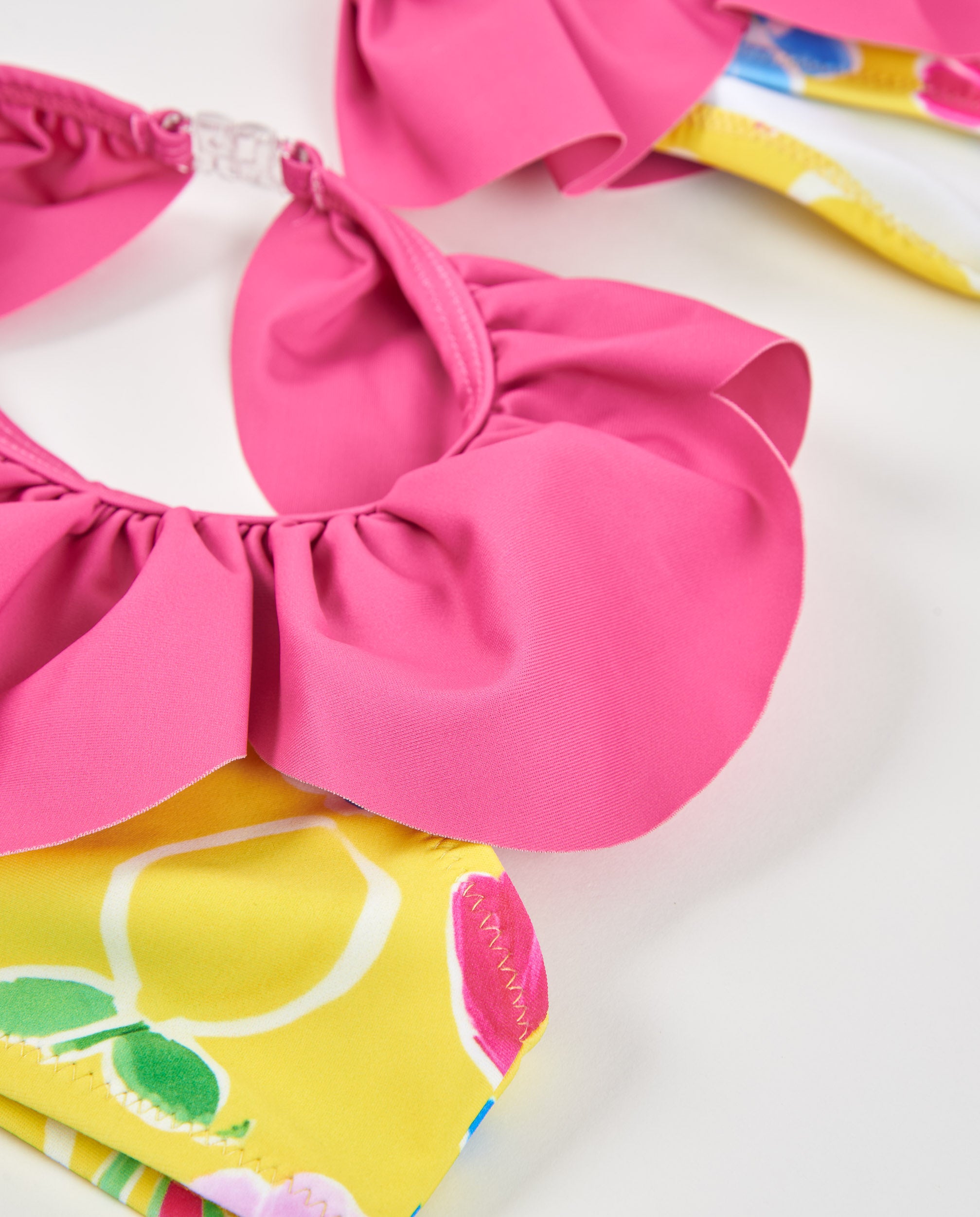 Tuc tuc bikini bambina giallo con volant rosa