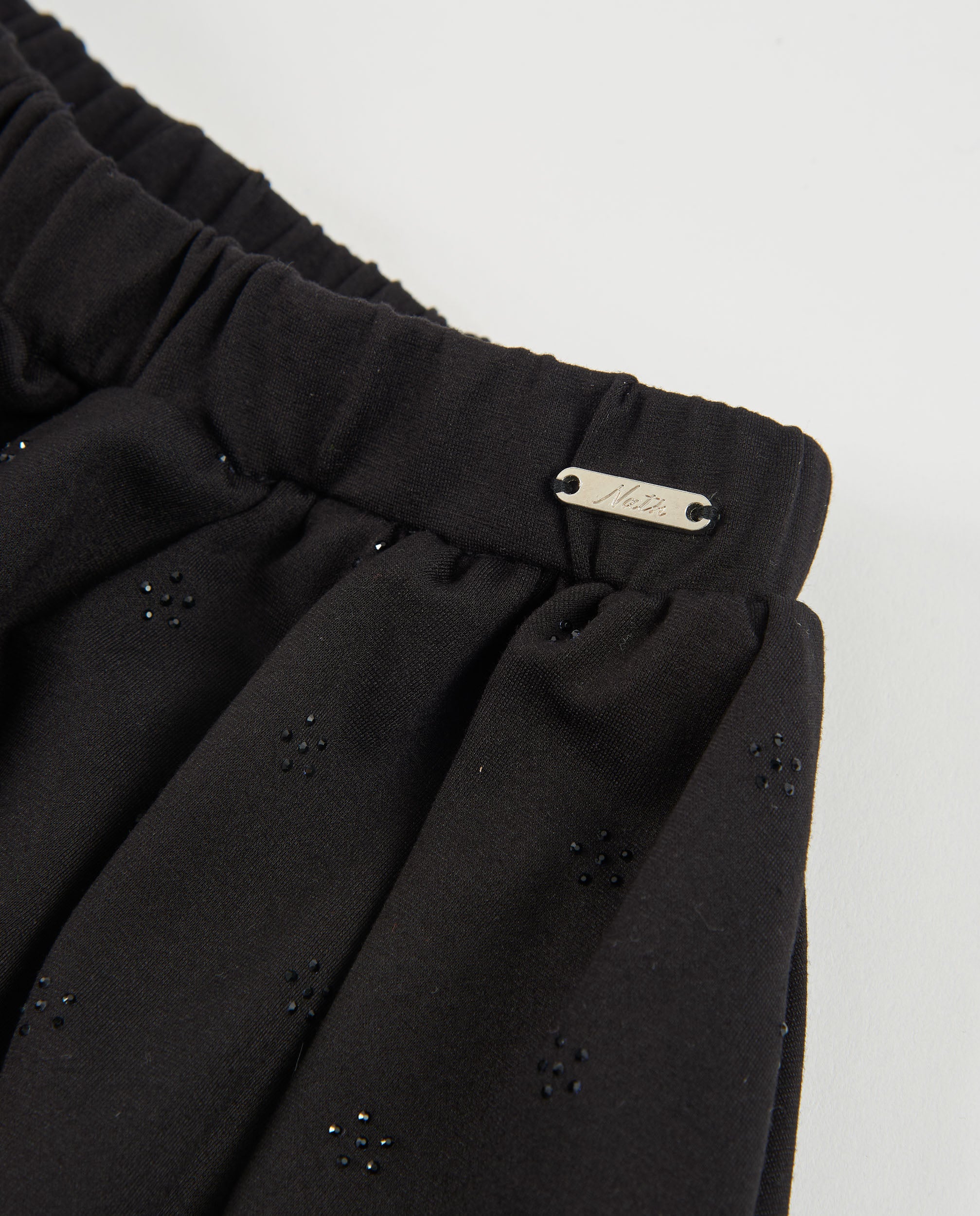 Tuc tuc gonna bambina maglia nera fiore elastica